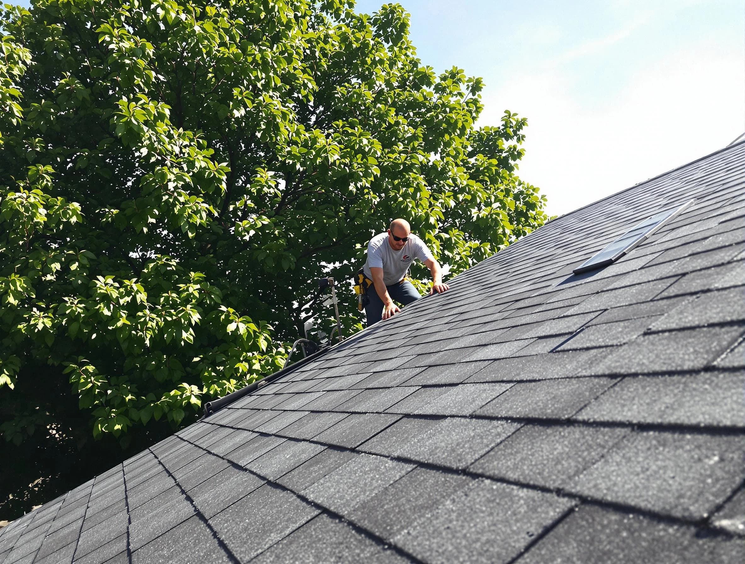 Certified roofers from Wickliffe Roofing Company working in Wickliffe, OH